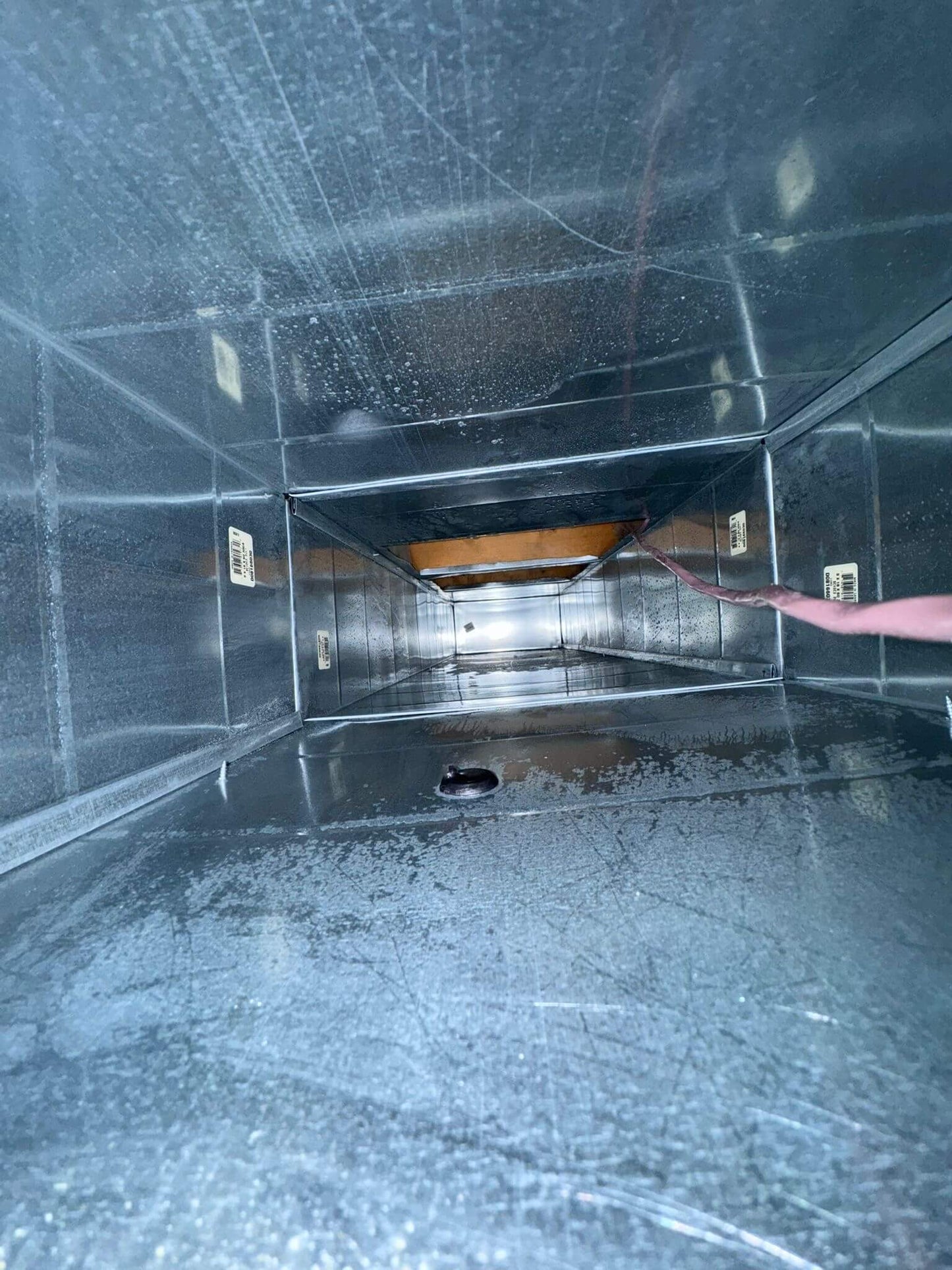 Residential air duct cleaning image showing duct condition after cleaning by Power HVAC Services Inc.