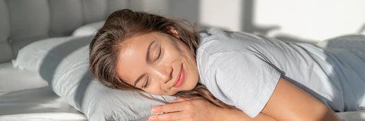 Lady sleeping in a comfortable bed Clean Ducts and Better Sleep. Indoor air quality improved by air duct cleaning services by Power HVAC Services in GTA.