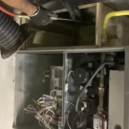 Cleaning of residential Furnace performed by Power HVAC Services technician.