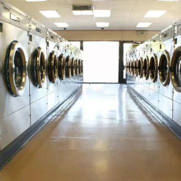 Experience modern efficiency with Power HVAC Services Commercial Air Duct Cleaning of Laundromat. Located in the GTA, our service ensures sparkling results with robot-assisted technology, highlighting the importance of clean environments in well-lit industrial spaces.