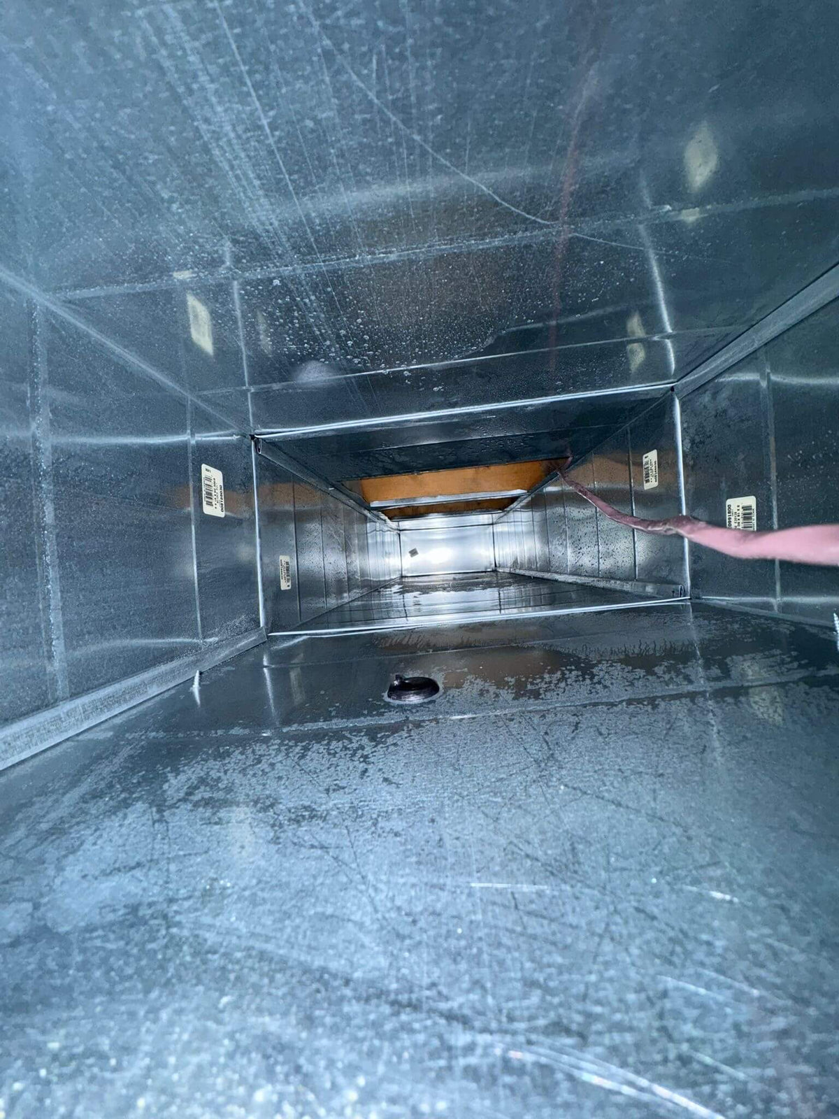 Residential air duct cleaning image showing duct condition after cleaning by Power HVAC Services Inc.