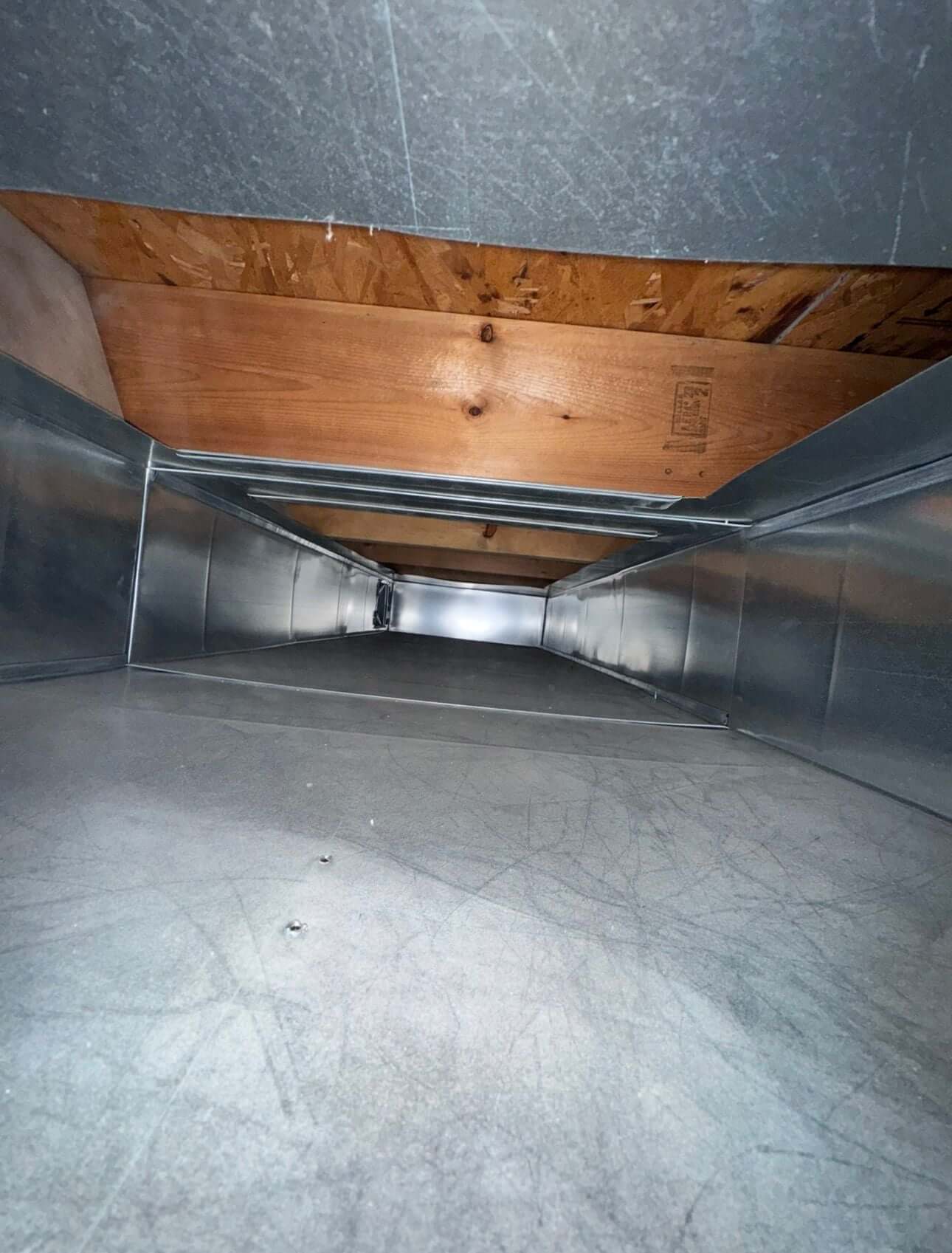 Showing condition of a duct after air duct of Duct Cleaning in Torontocleaning by Power HVAC Services Inc.