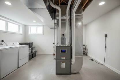 Basement with HVAC system, washer, dryer, and storage bins and furnace cleaning